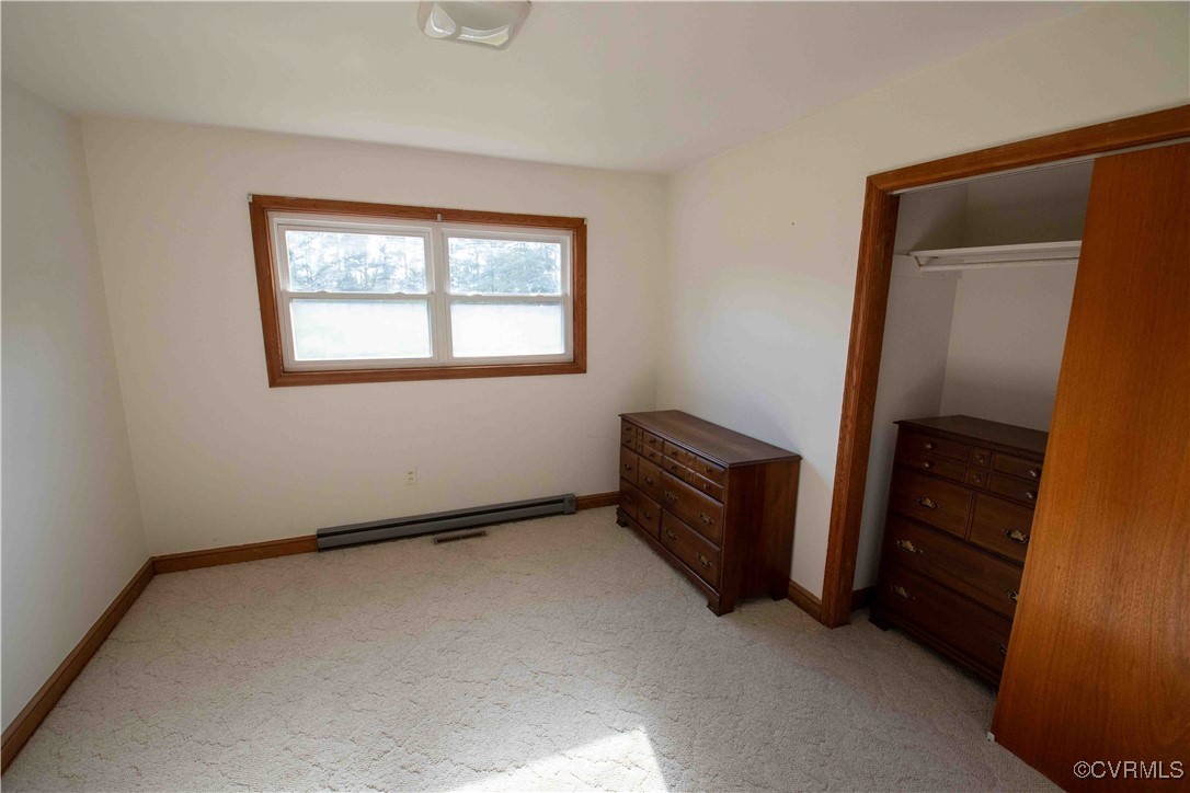 2600 Brunswick Road Blackstone, VA 23824 - Photo 10 of 35 Unfurnished bedroom with a baseboard radiator, a c