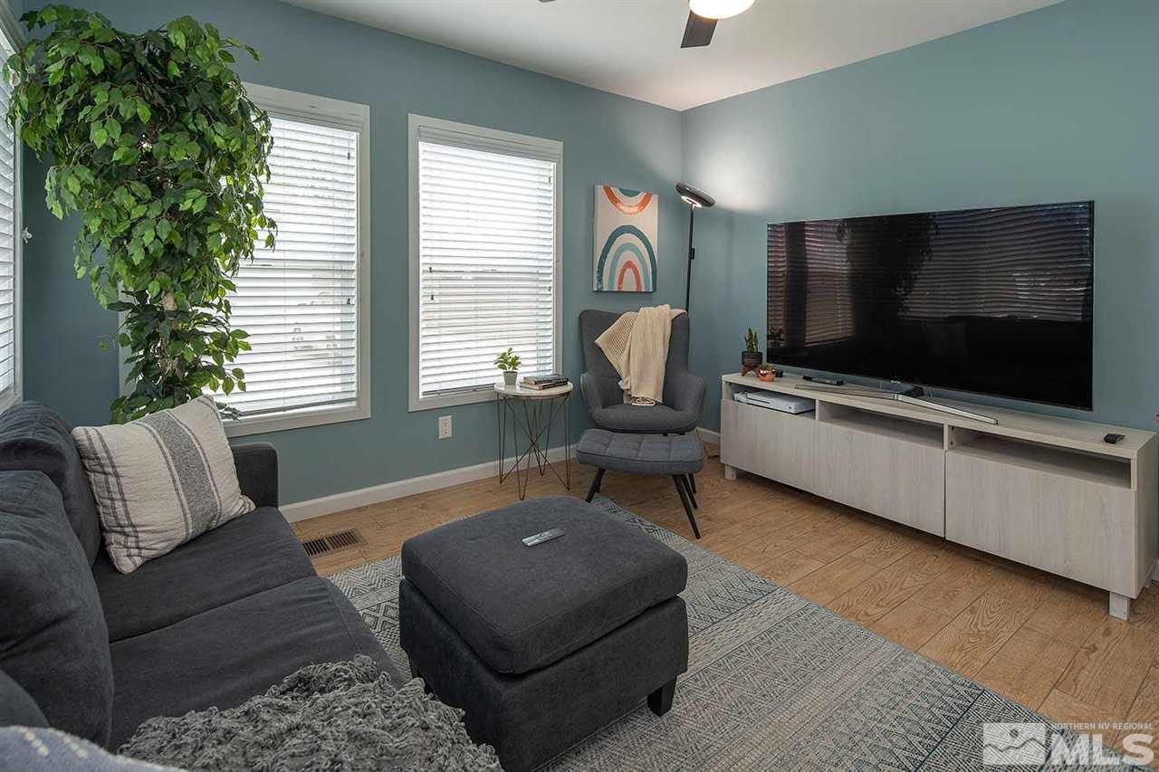 618 Thoma Street Reno, NV 89502 - Photo 3 of 31 a living room with furniture and a flat screen tv