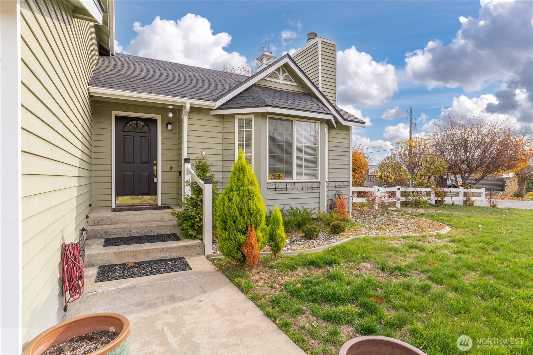 1501 Angela Street Wenatchee, WA 98801 - Photo 2 of 30 a view of a house with backyard and garden