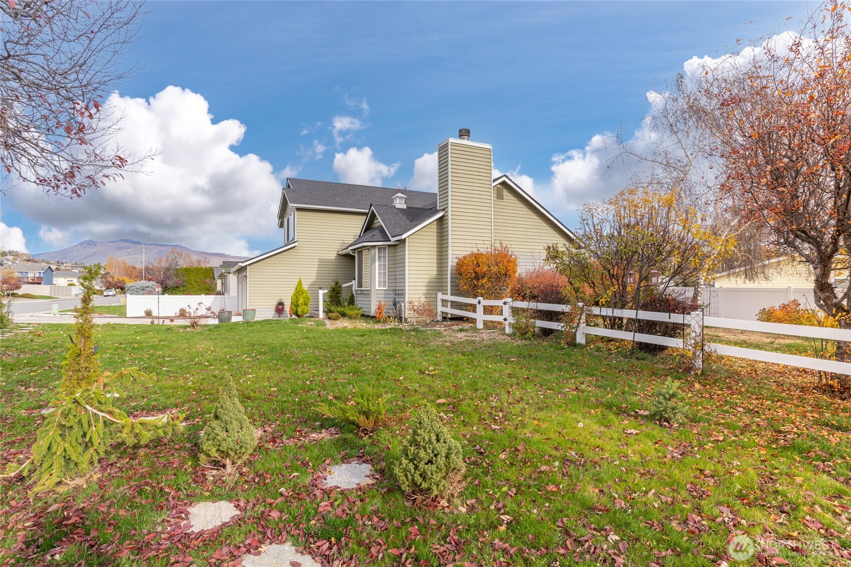 1501 Angela Street Wenatchee, WA 98801 - Photo 27 of 30 a view of a house with a yard