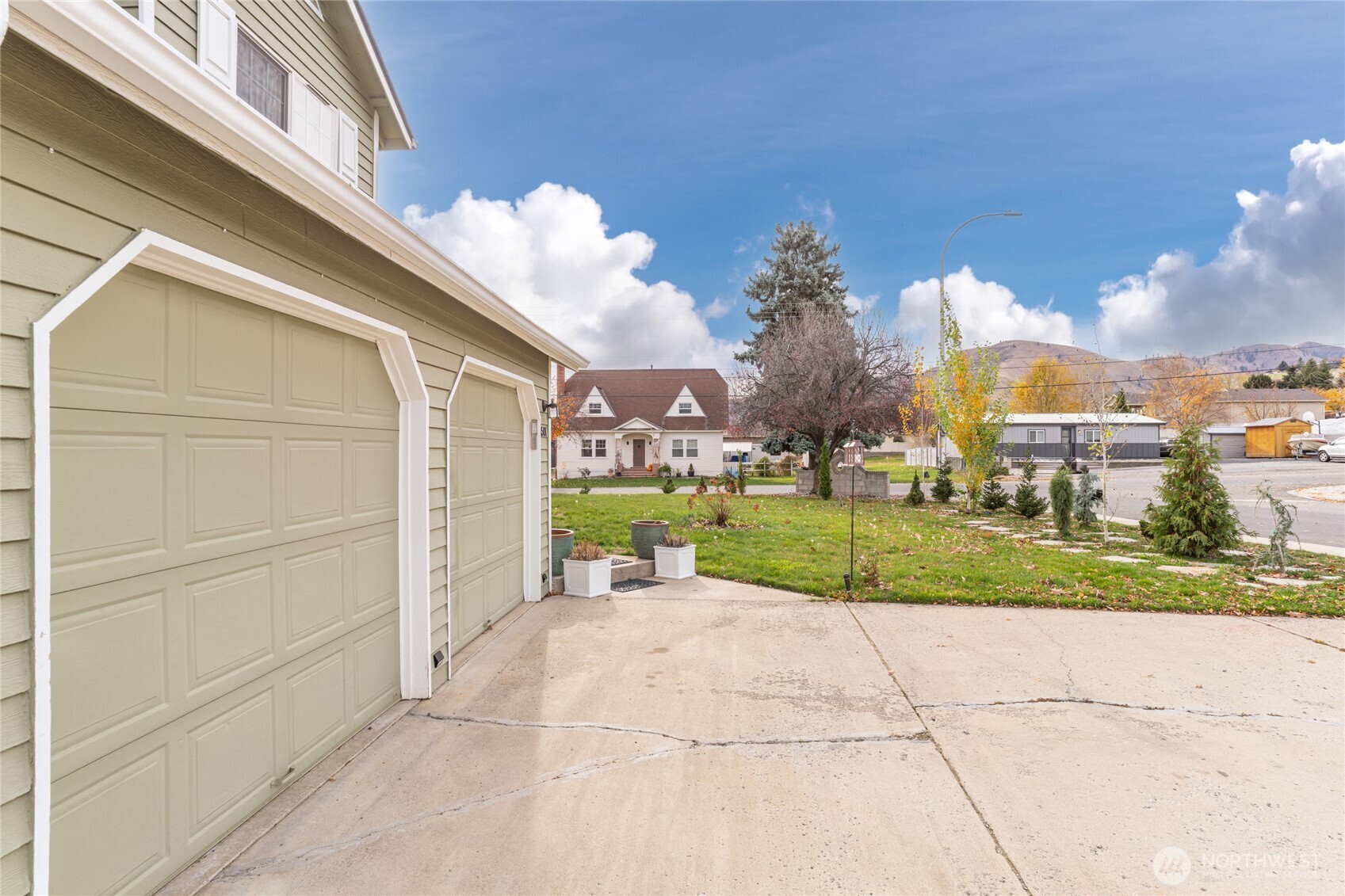 1501 Angela Street Wenatchee, WA 98801 - Photo 3 of 30 a view of a house with a yard