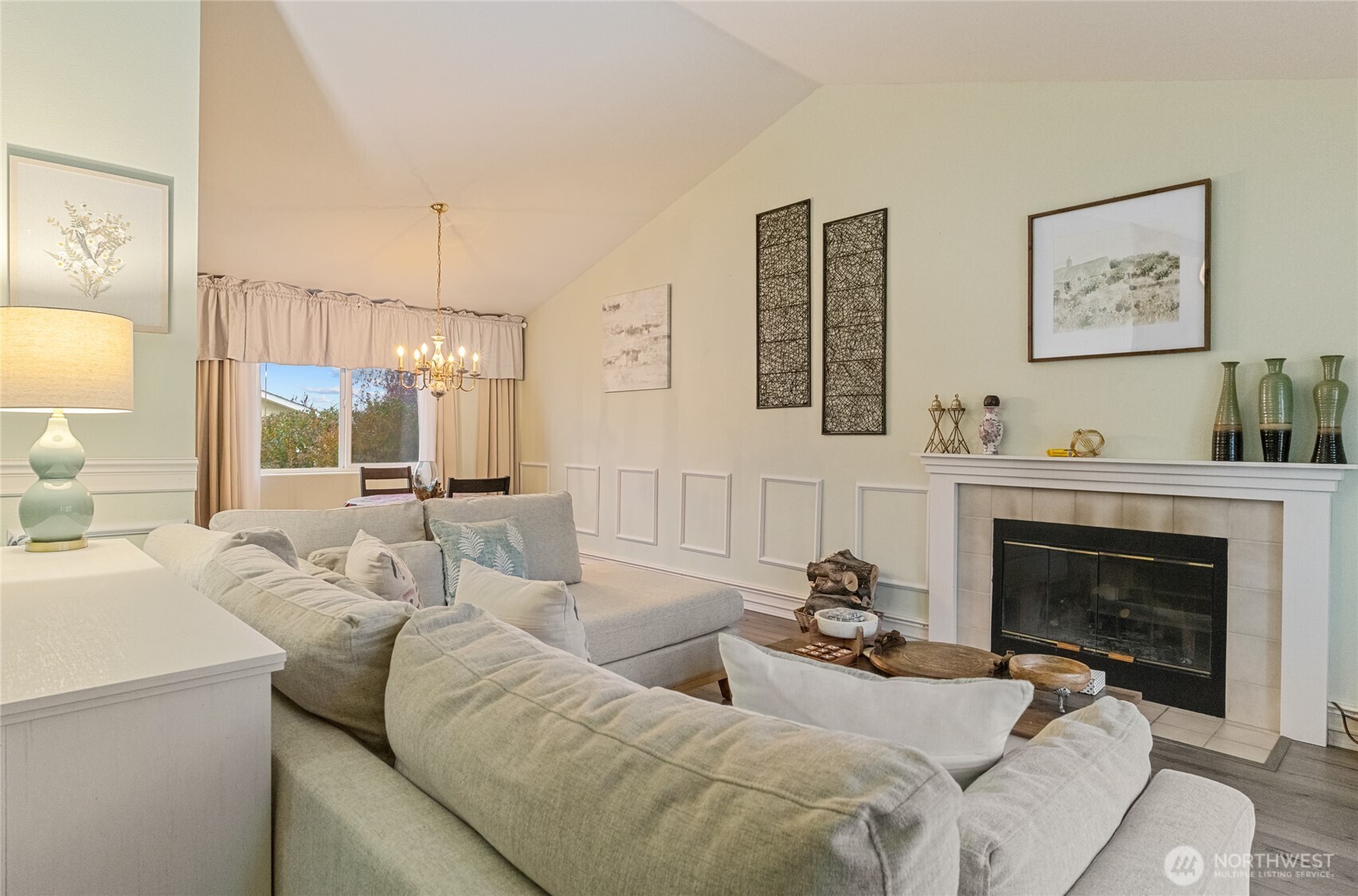1501 Angela Street Wenatchee, WA 98801 - Photo 5 of 30 a living room with furniture a flat screen tv and a fireplace