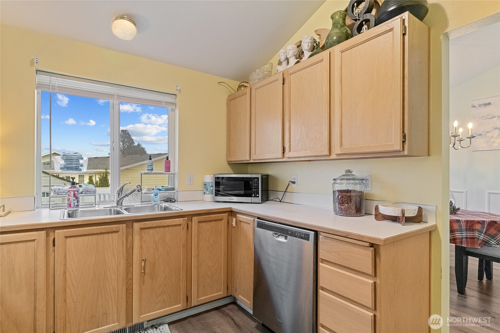 1501 Angela Street Wenatchee, WA 98801 - Photo 9 of 30 a kitchen with sink cabinets and appliances