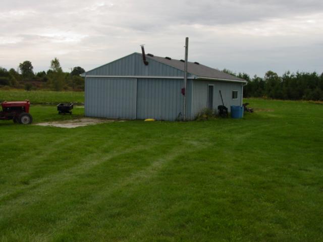 455 West Wellman Line Road Melvin, MI 48454 - Photo 13 of 20 This is a view of the 24x36 pole barn.