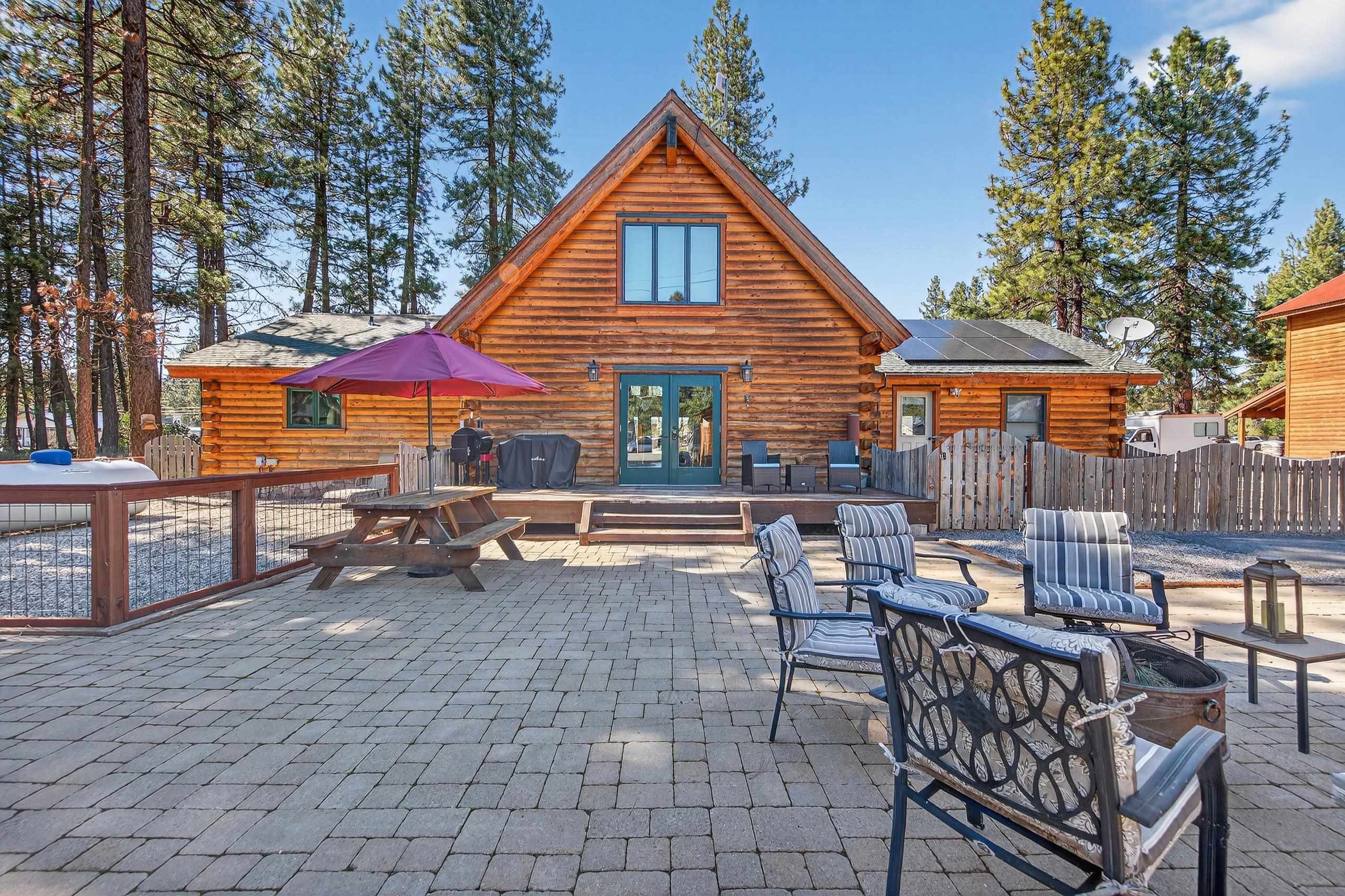 645 Main Street Chester, CA 96020 - Photo 24 of 43 an outdoor space with patio lots of furniture and wooden fence