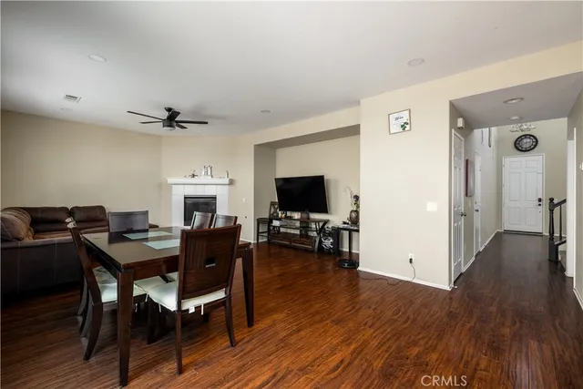 a view of a livingroom with furniture and a flat screen tv