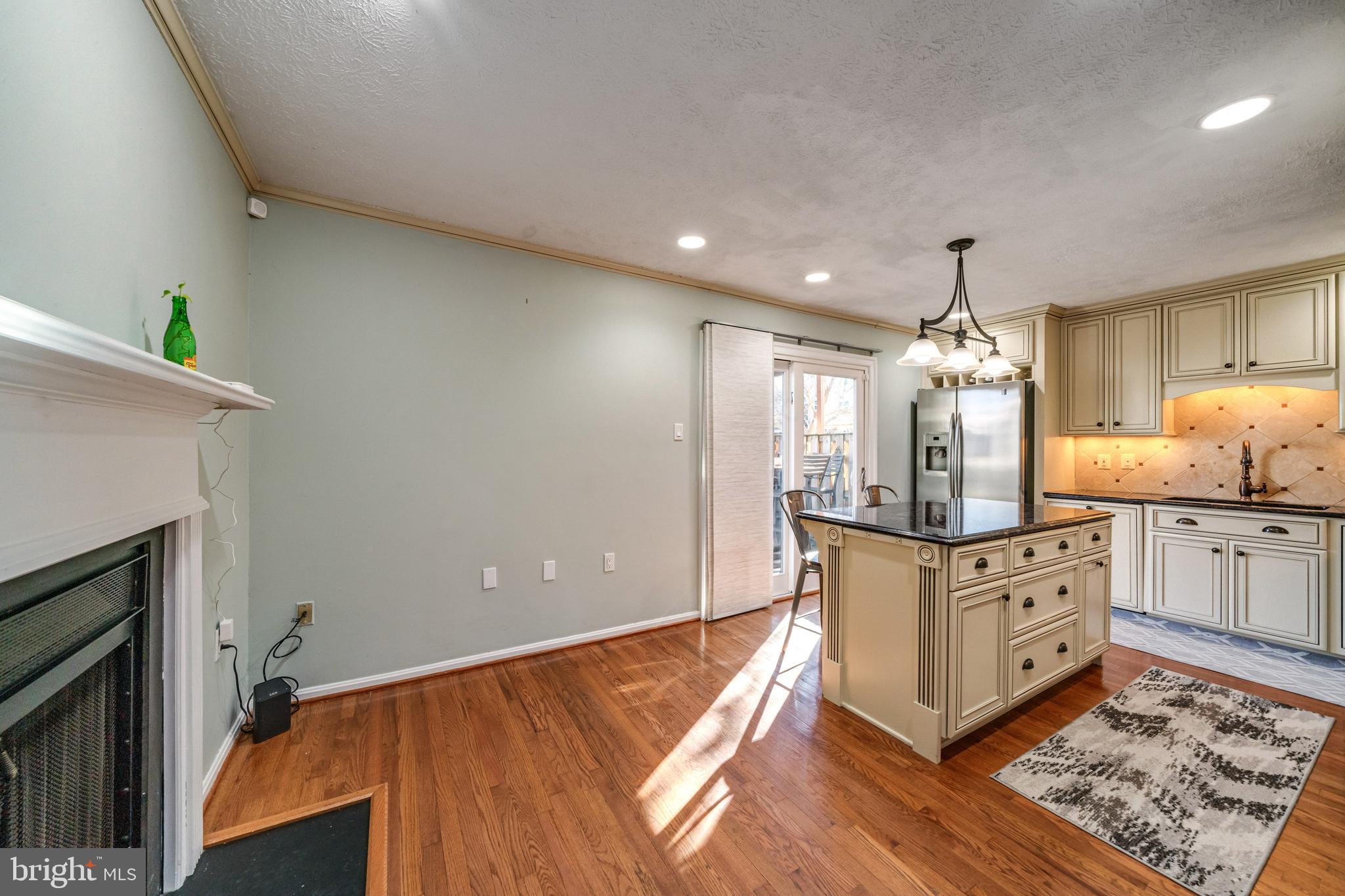 7251 Kousa Lane Springfield, VA 22152 - Photo 6 of 31 Breakfast nook with cozy wood burning fireplace