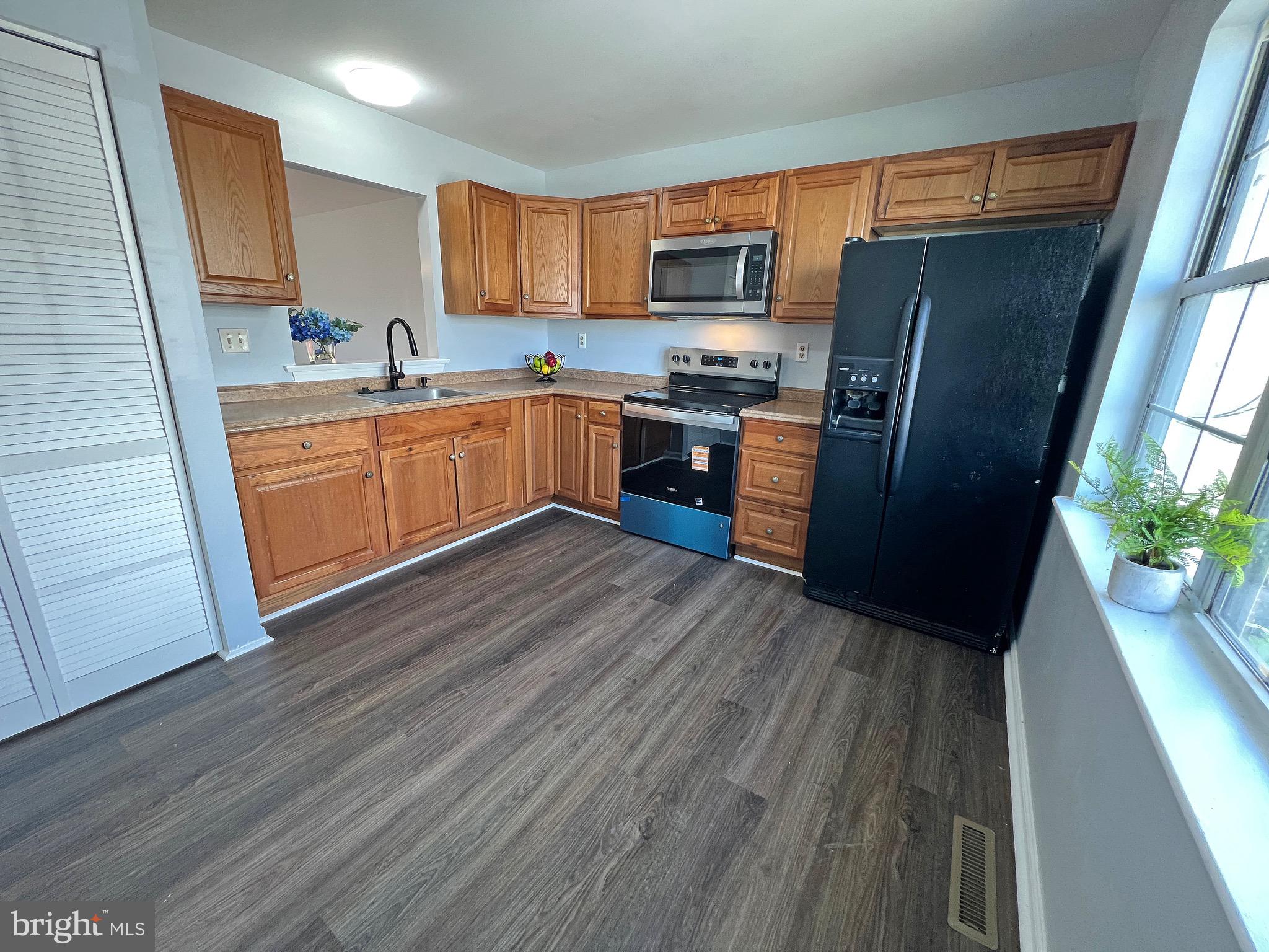 1049 Old Forge Road New Castle, DE 19720 - Photo 4 of 27 Renovated kitchen open to the living & dining room
