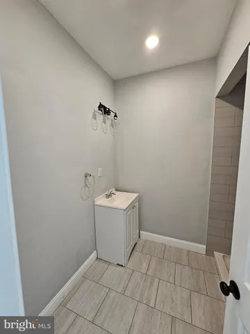 a room with a dryer and washer