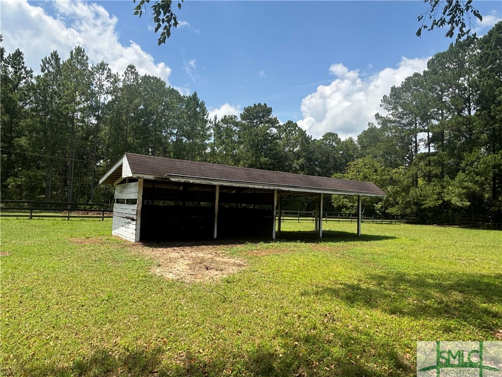 910 Kolic Helmey Road Guyton, GA 31312 - Photo 18 of 40 Horse shelter