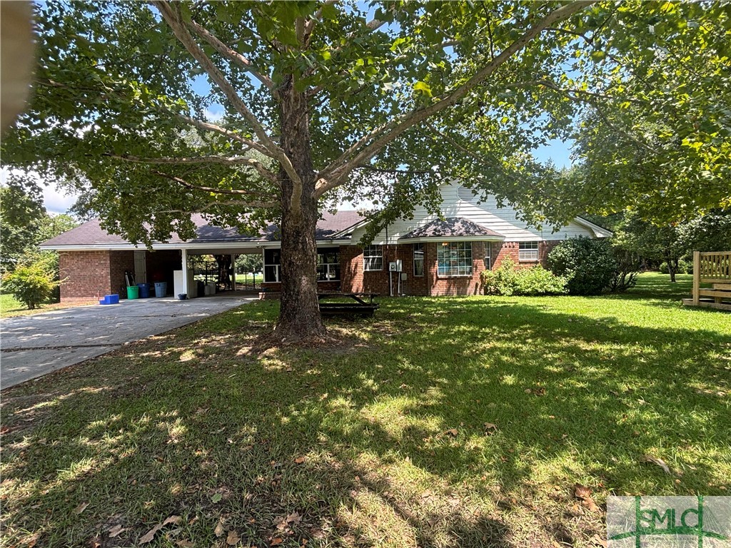 910 Kolic Helmey Road Guyton, GA 31312 - Photo 24 of 40 Left side