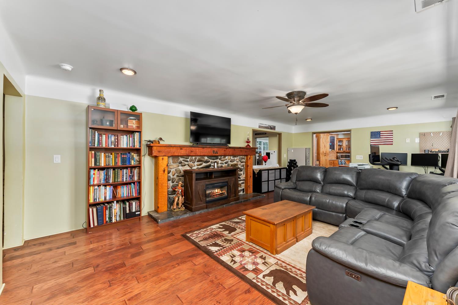 12850 Fiddletown Road Plymouth, CA 95669 - Photo 35 of 88 Custom wood mantel, real fireplace behind electric fireplace.
