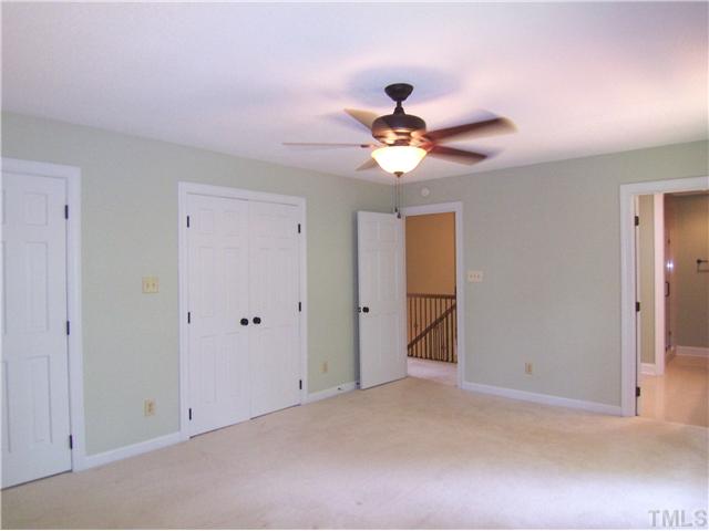 6905 Brook Ridge Court Raleigh, NC 27615 - Photo 17 of 25 Another view of the lg Master Bedroom shows the NEW CF and 2 of the lg closets (the 3rd is in the private Bath).