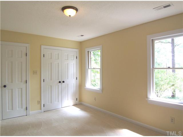 6905 Brook Ridge Court Raleigh, NC 27615 - Photo 20 of 25 View of Bedroom 3 which has dbl closets.