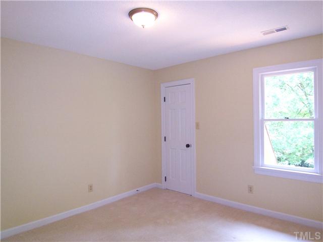 6905 Brook Ridge Court Raleigh, NC 27615 - Photo 21 of 25 Bedroom 4 has a lg WIC.