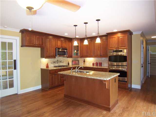 6905 Brook Ridge Court Raleigh, NC 27615 - Photo 10 of 25 Closer view of the Kitchen work area.