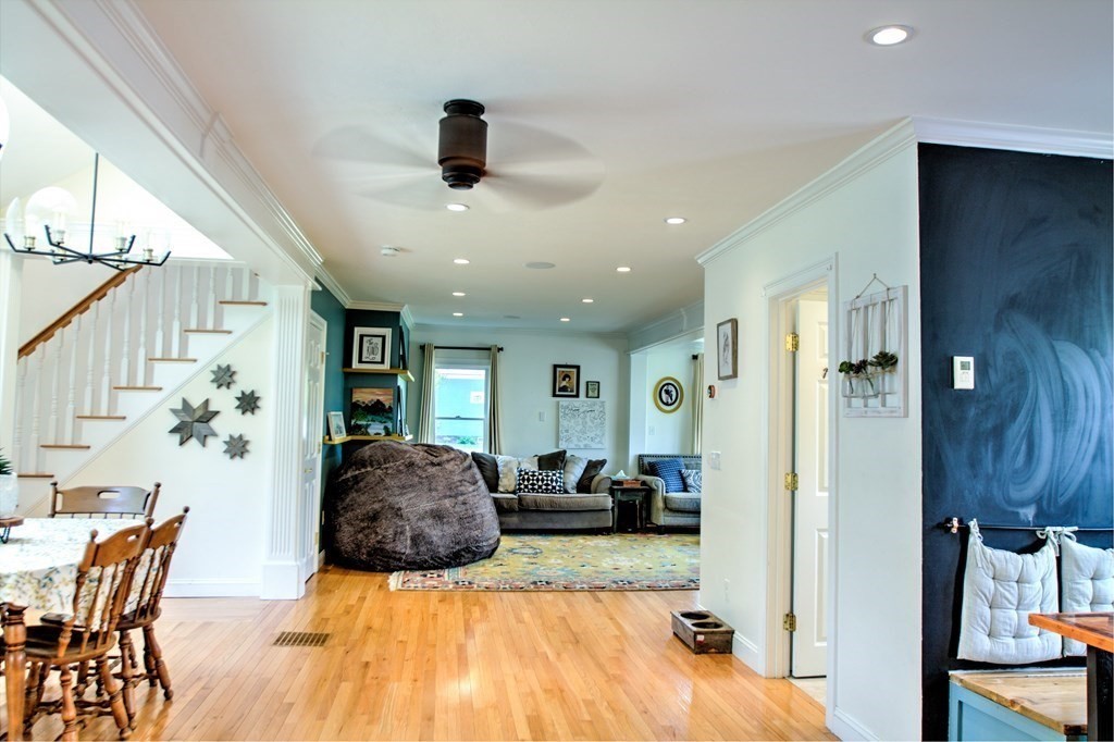 5 3rd Street Ayer, MA 01432 - Photo 11 of 42 a living room with furniture and a chandelier