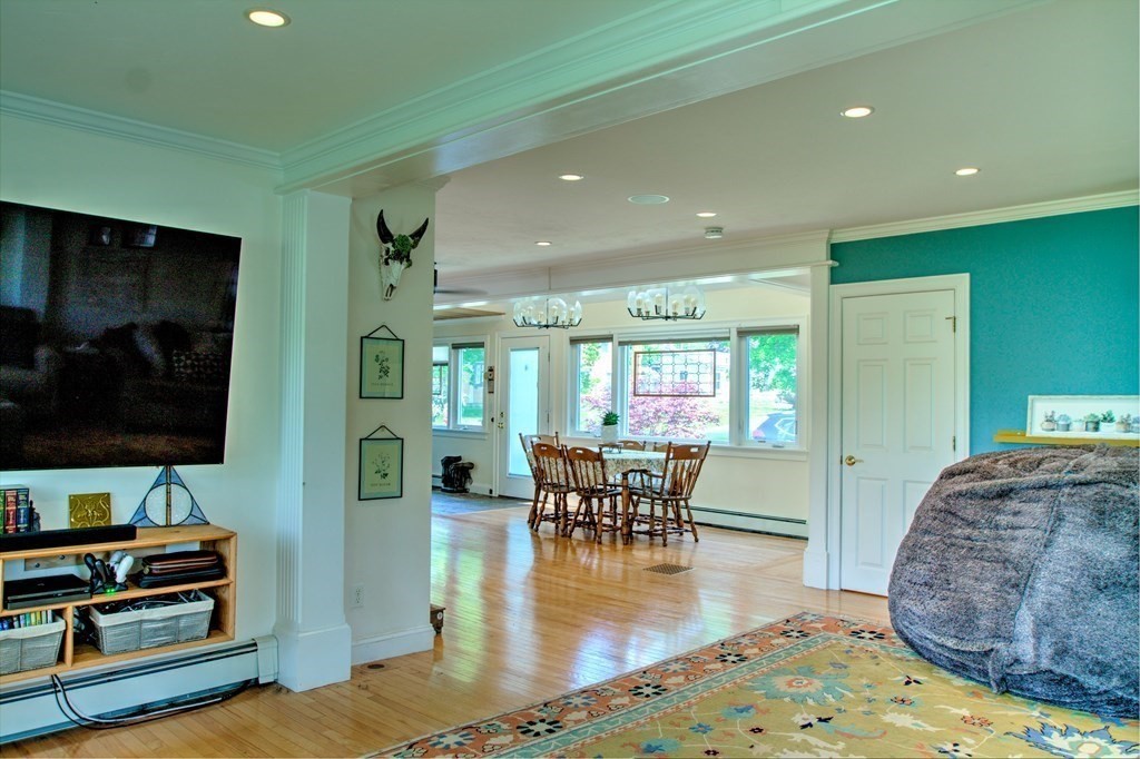 5 3rd Street Ayer, MA 01432 - Photo 15 of 42 a living room with furniture and a flat screen tv