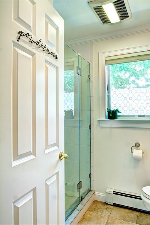 5 3rd Street Ayer, MA 01432 - Photo 16 of 42 a bathroom with a bathtub and a shower