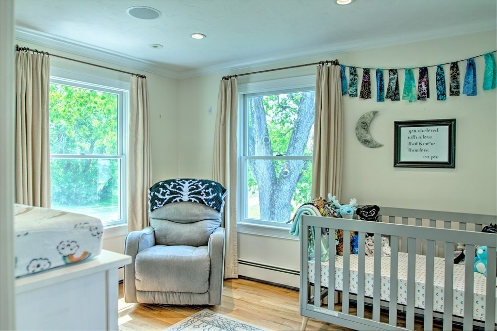 5 3rd Street Ayer, MA 01432 - Photo 21 of 42 a bedroom with furniture and a large window