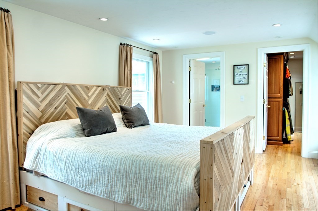 5 3rd Street Ayer, MA 01432 - Photo 23 of 42 a bedroom with a bed and a window