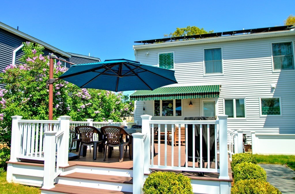 5 3rd Street Ayer, MA 01432 - Photo 28 of 42 a view of a house with wooden deck and furniture