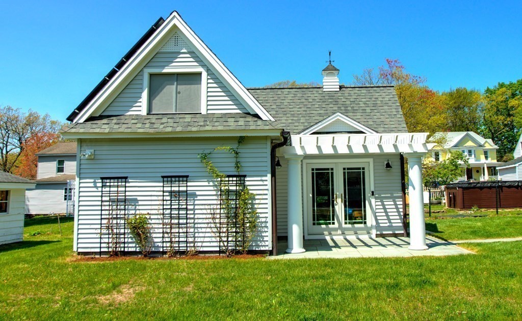 5 3rd Street Ayer, MA 01432 - Photo 31 of 42 a front view of a house with a yard