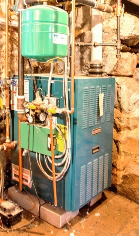 5 3rd Street Ayer, MA 01432 - Photo 40 of 42 a view of an outdoor sitting area in front of a building