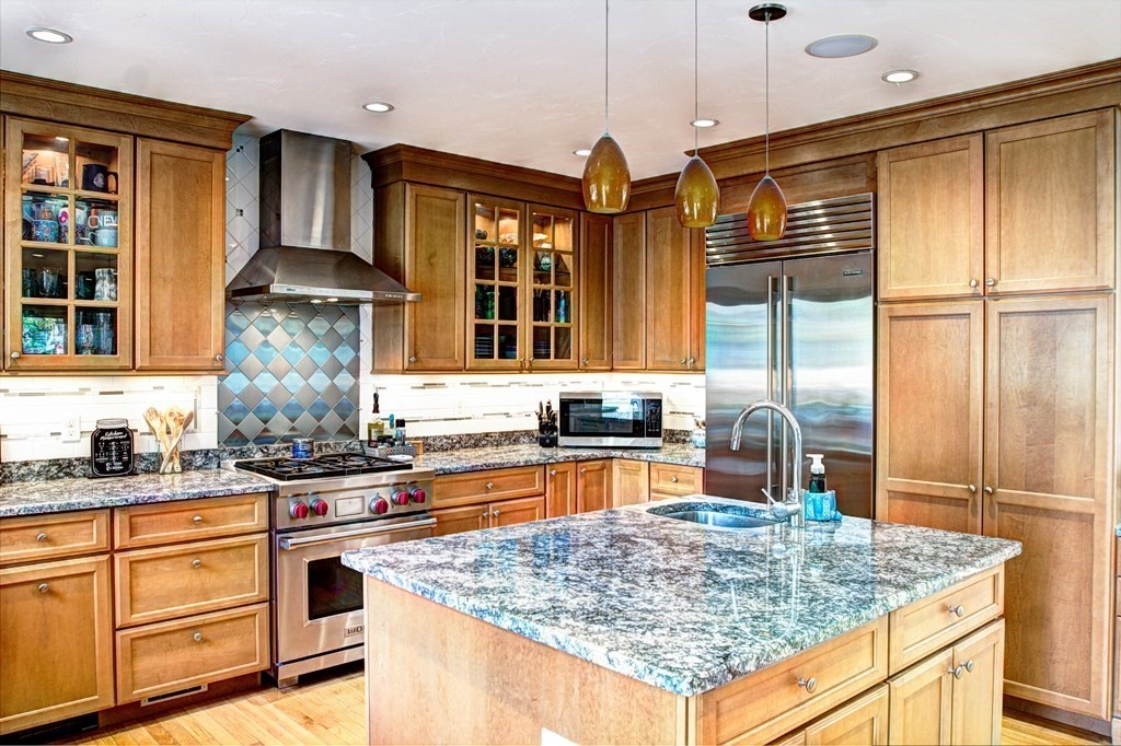 5 3rd Street Ayer, MA 01432 - Photo 5 of 42 a kitchen with stainless steel appliances granite countertop a sink a stove and a microwave
