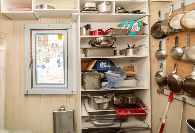 a room with storage and utility