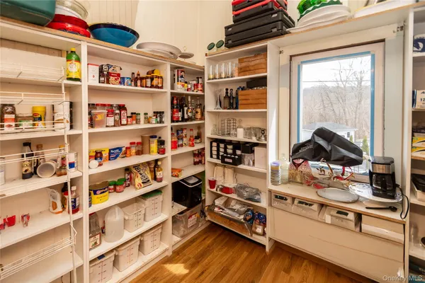 a view of a kitchen with a stove and a refrigerator
