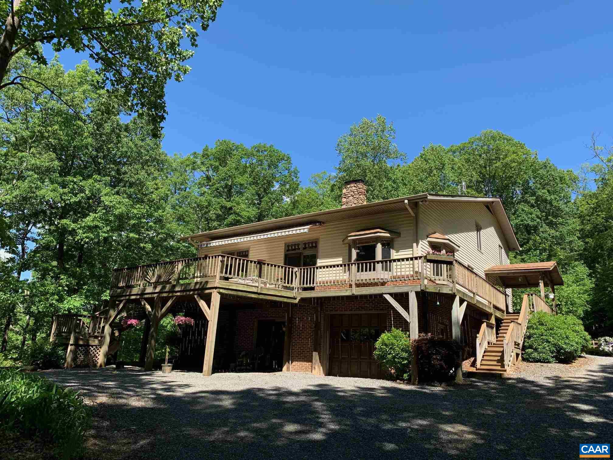 2765 Seville Road Madison, VA 22727 - Photo 1 of 50 a front view of a house with a yard