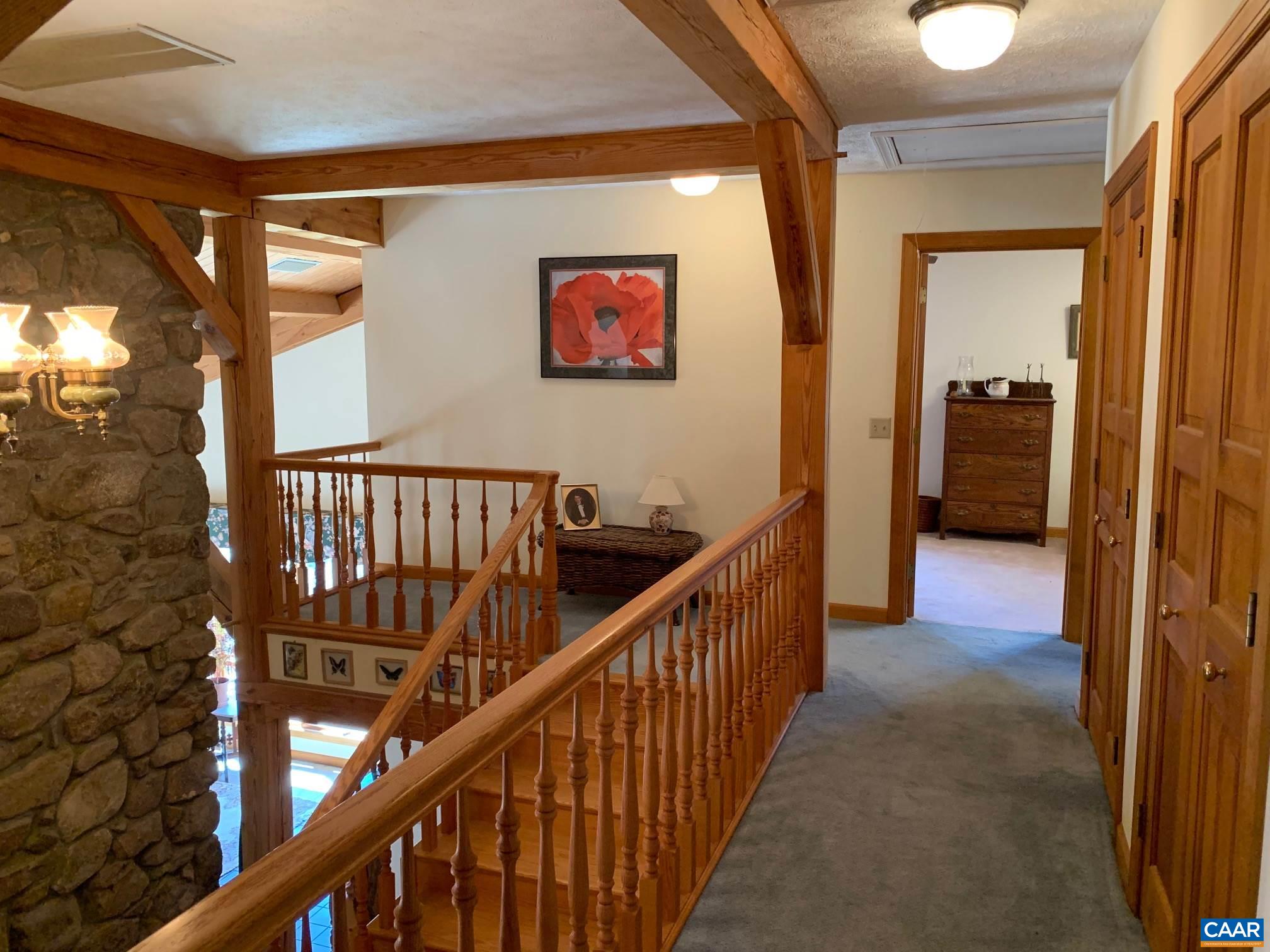 2765 Seville Road Madison, VA 22727 - Photo 23 of 50 a view of a hallway with wooden staircase