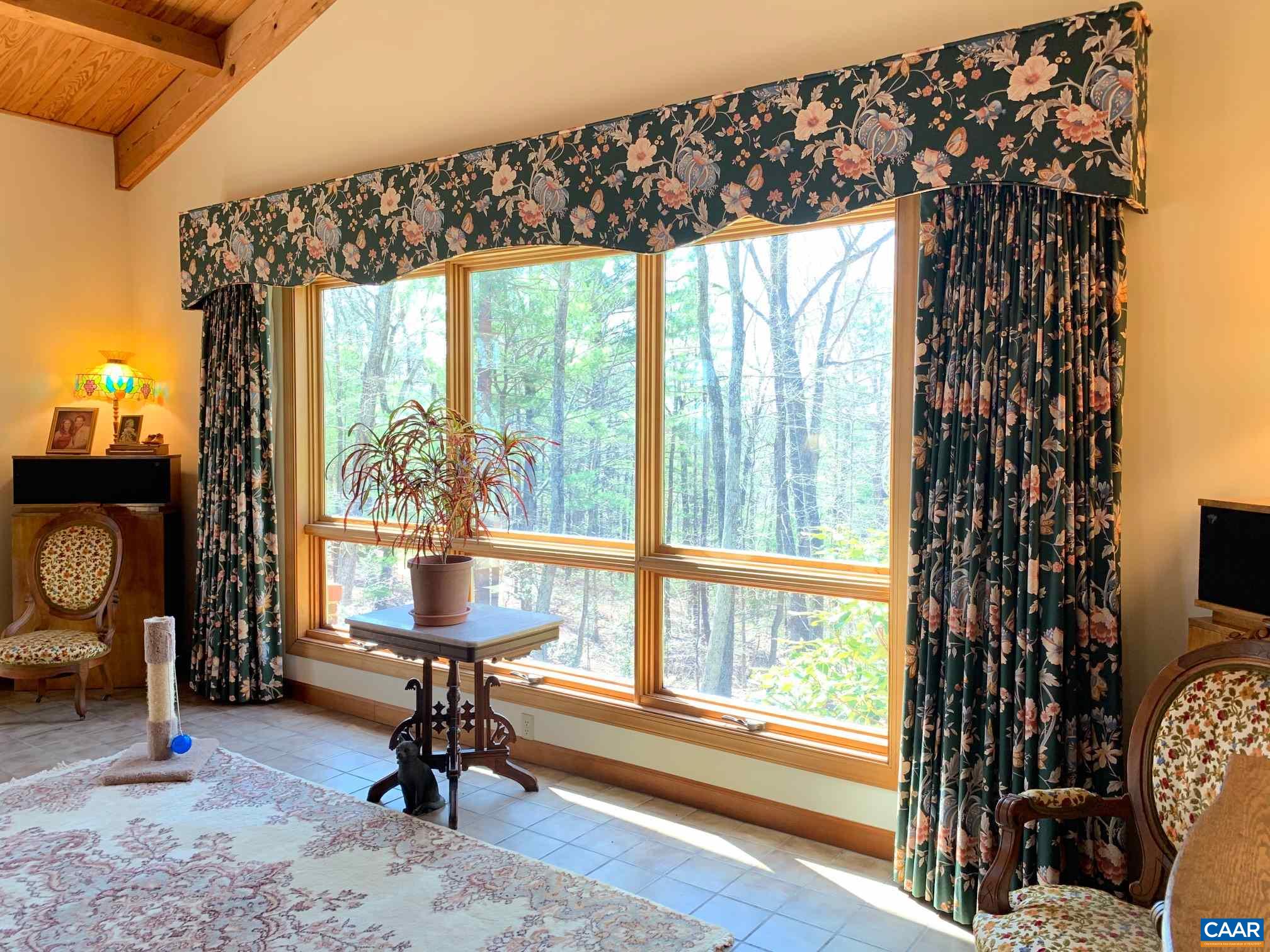 2765 Seville Road Madison, VA 22727 - Photo 8 of 50 a living room with furniture and a window