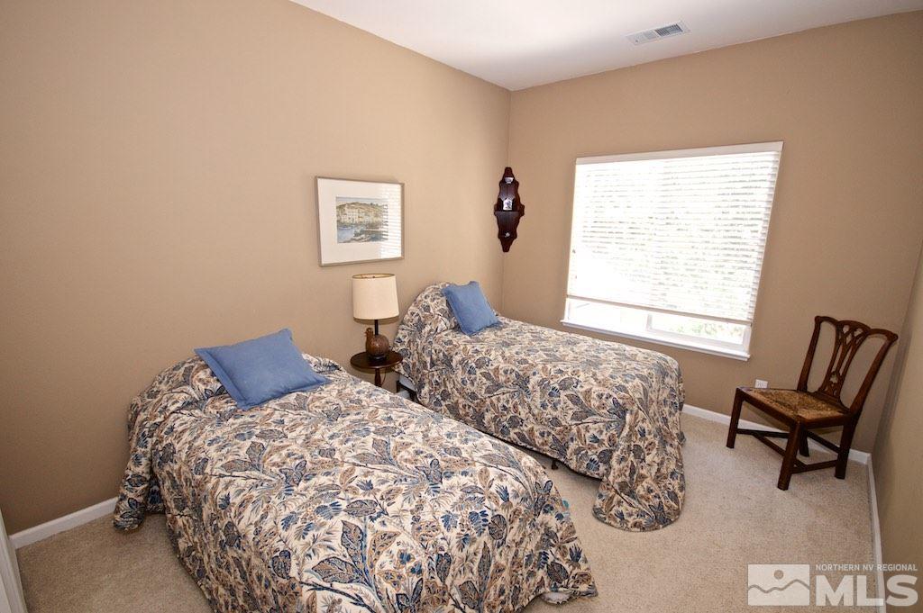 1820 Hunter Creek Road Reno, NV 89519 - Photo 15 of 22 a bedroom with two beds and a window
