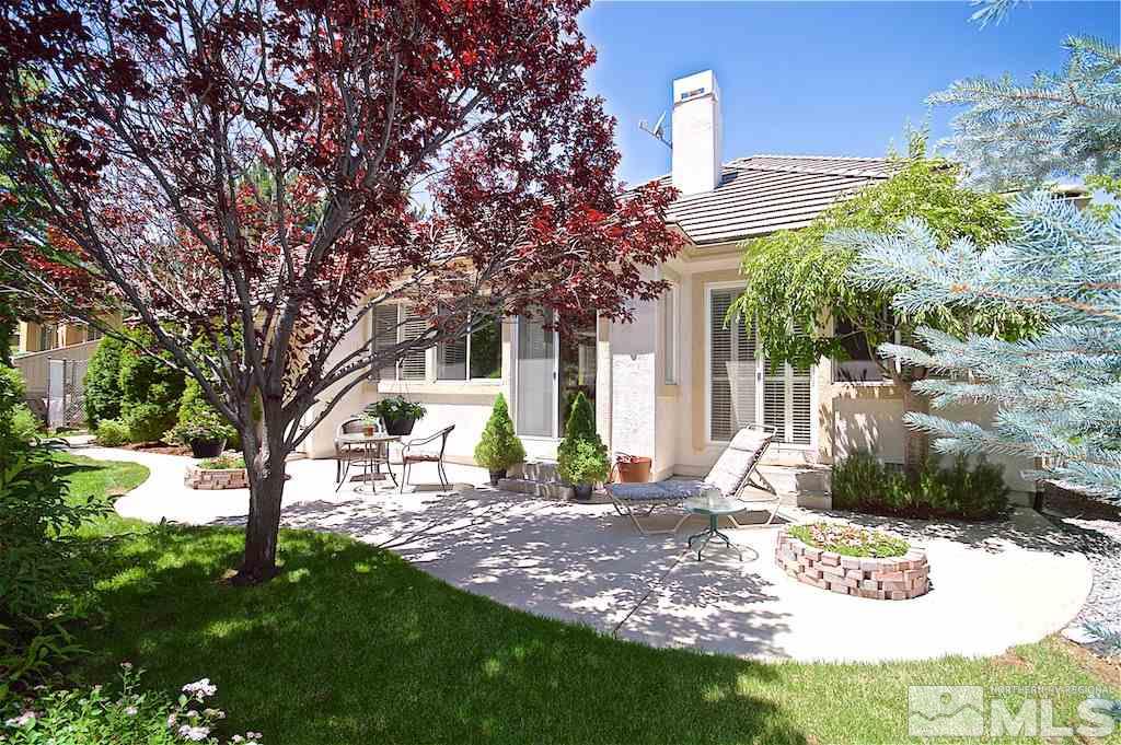 1820 Hunter Creek Road Reno, NV 89519 - Photo 21 of 22 a view of a house with backyard and sitting area
