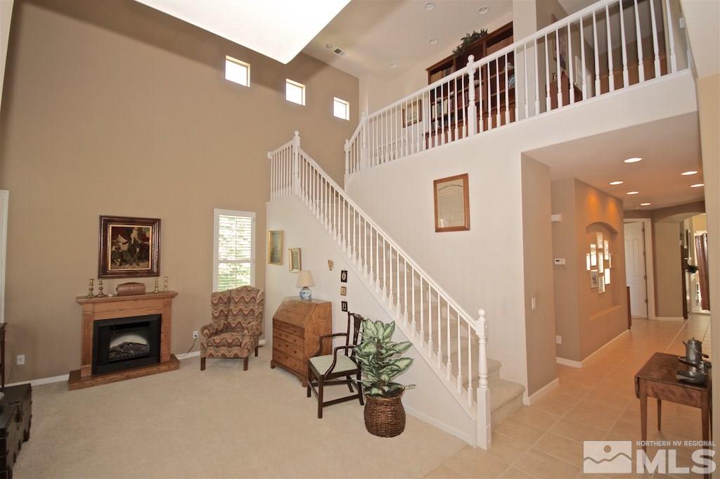 1820 Hunter Creek Road Reno, NV 89519 - Photo 4 of 22 a view of a livingroom with furniture and staircase