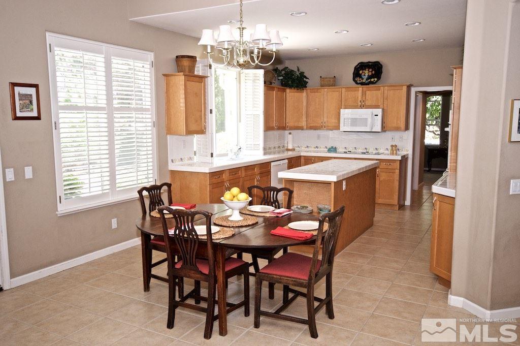 1820 Hunter Creek Road Reno, NV 89519 - Photo 5 of 22 a view of a dining room with furniture and window