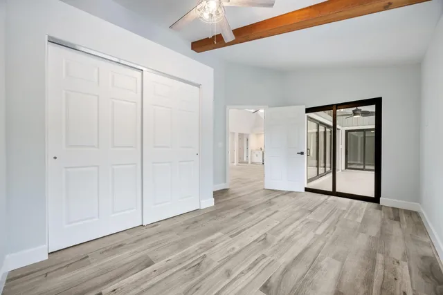 a view of a livingroom with wooden floor