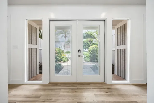 a view of entryway with wooden floor