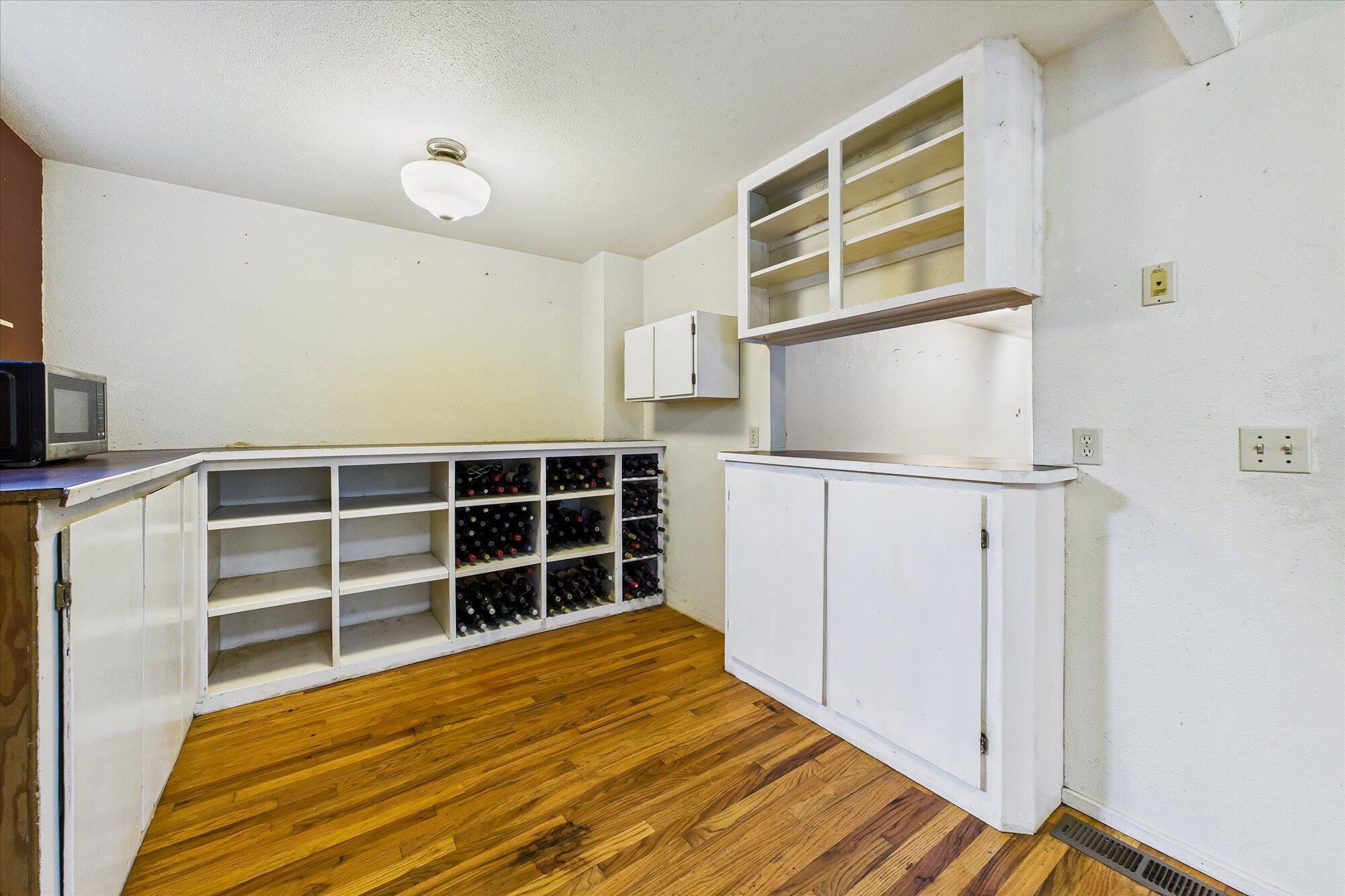 119 Sylva Street Arcata, CA 95521 - Photo 15 of 35 a view of an empty room with wooden floor and a window
