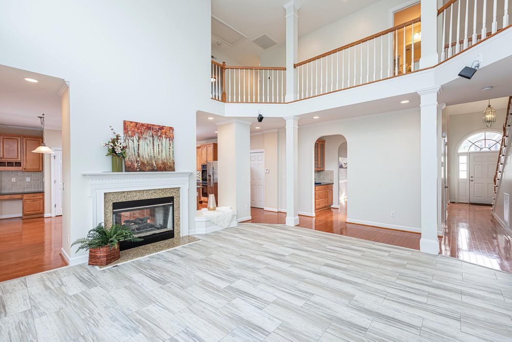 3105 Hummer Way Raleigh, NC 27614 - Photo 4 of 30 Gas log fireplace is open to the Family Room and into he Breakfast Nook. Family Room