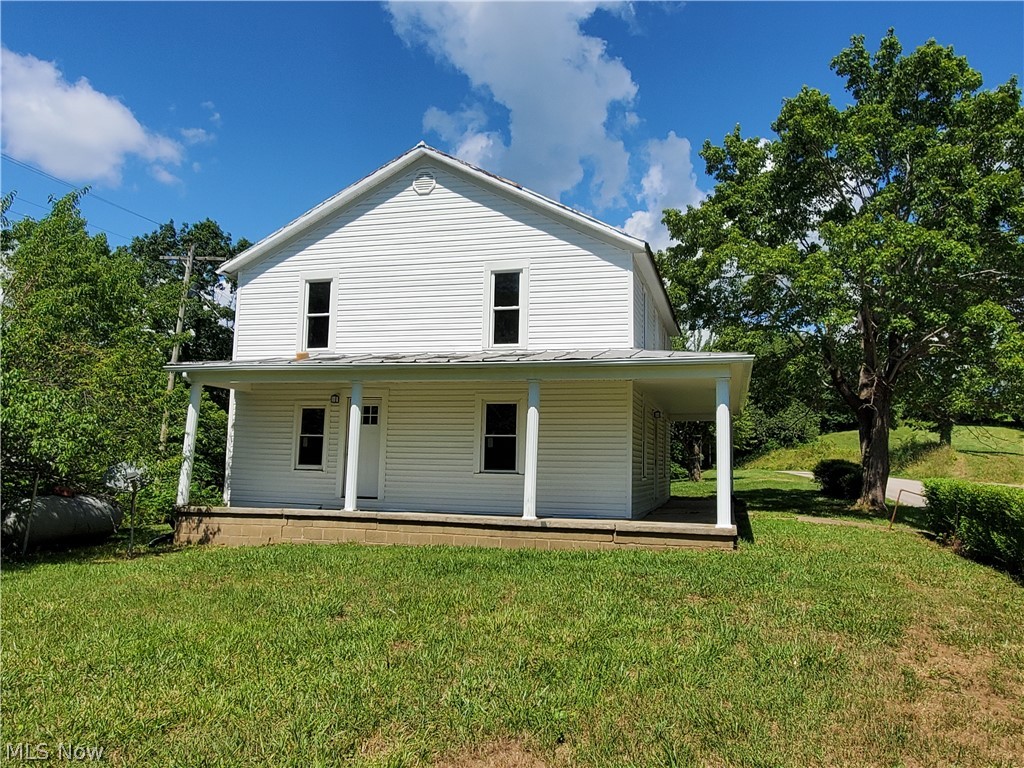 40081 Pleasant Ridge Road Graysville, OH 45734 - Photo 2 of 29 Side view of home.