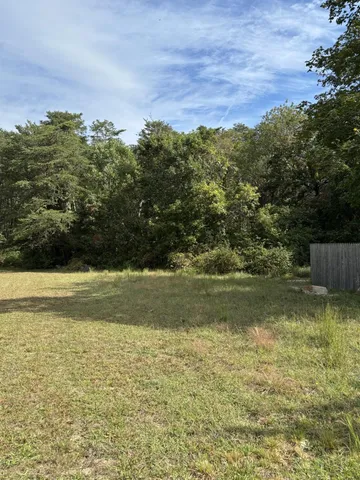 a view of a lake from a yard