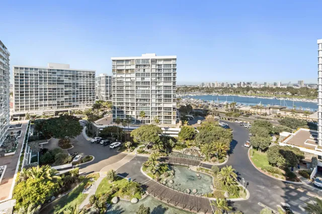 a view of swimming pool with outdoor seating and plants