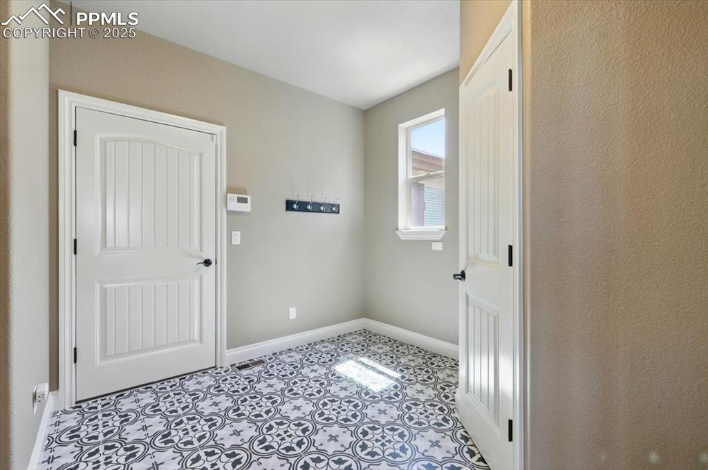 4577 Outlook Ridge Trail Colorado Springs, CO 80924 - Photo 16 of 45 a view of room with window and entryway