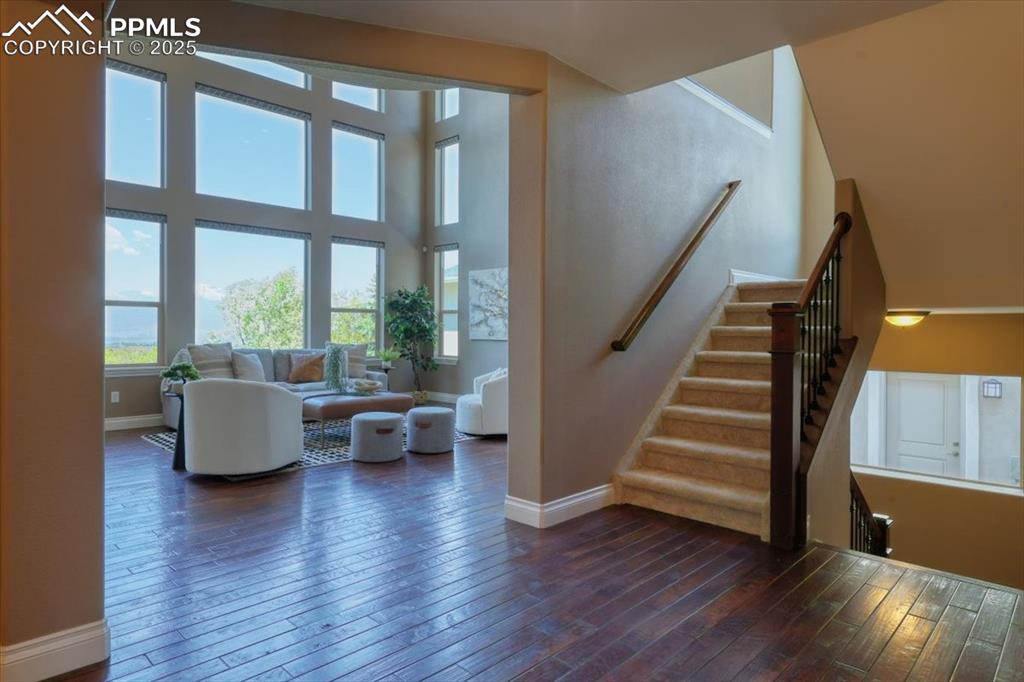 4577 Outlook Ridge Trail Colorado Springs, CO 80924 - Photo 17 of 45 a living room with furniture and a large window