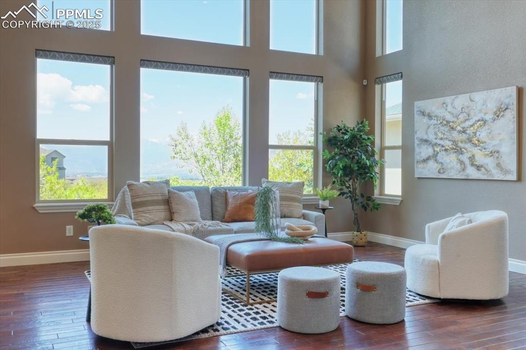 4577 Outlook Ridge Trail Colorado Springs, CO 80924 - Photo 18 of 45 a living room with furniture and a window