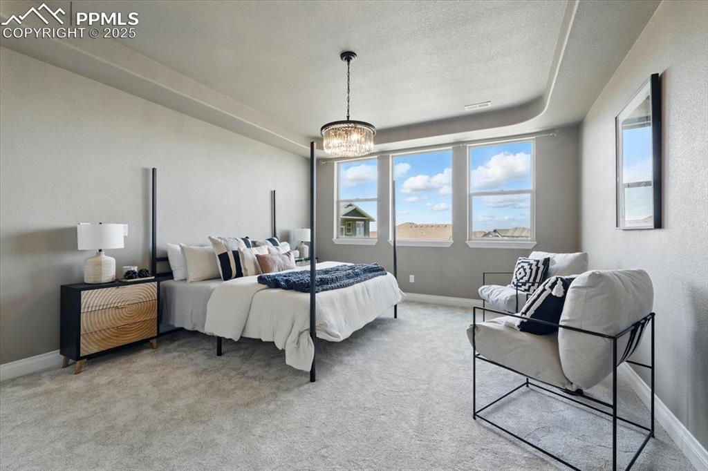 4577 Outlook Ridge Trail Colorado Springs, CO 80924 - Photo 20 of 45 a living room with furniture and a window