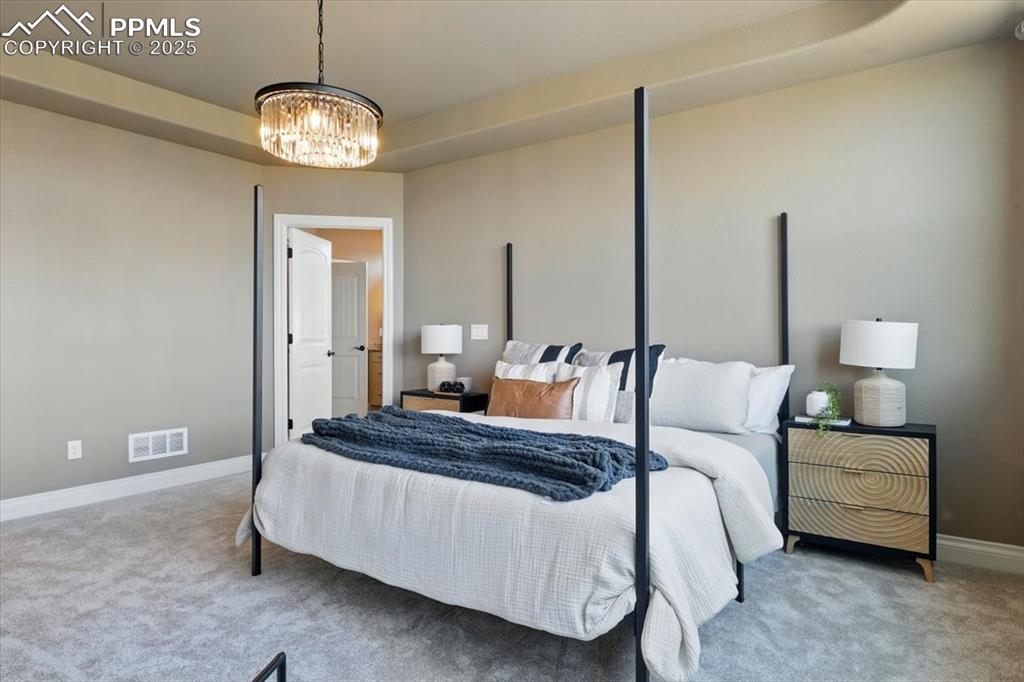 4577 Outlook Ridge Trail Colorado Springs, CO 80924 - Photo 22 of 45 a bedroom with bed and window